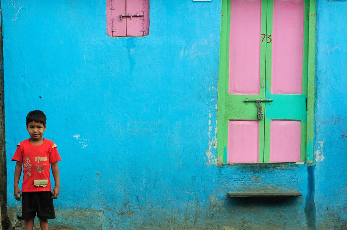 Kid in Red Against Pastel Blue, Mumbai